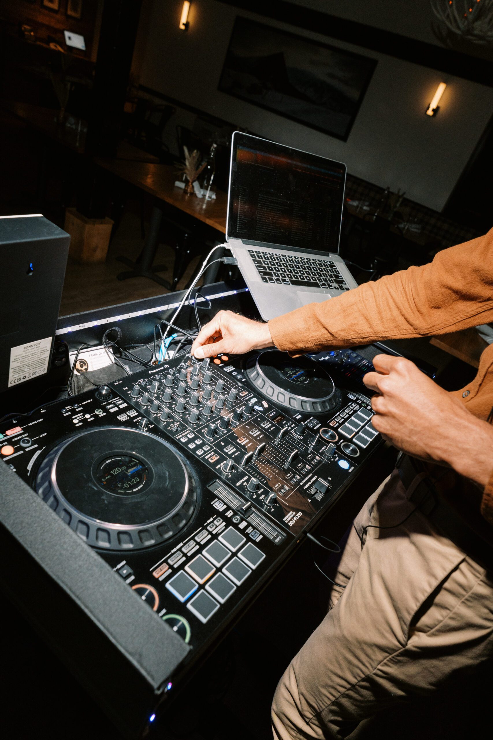 Bilingual wedding DJ in Colorado leading a wedding reception